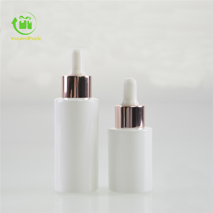 Glass essence bottle with dropper cap