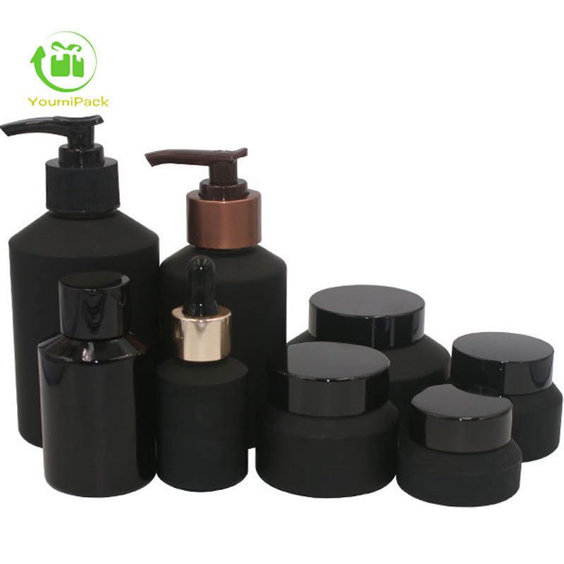 black glass bottles and jars set