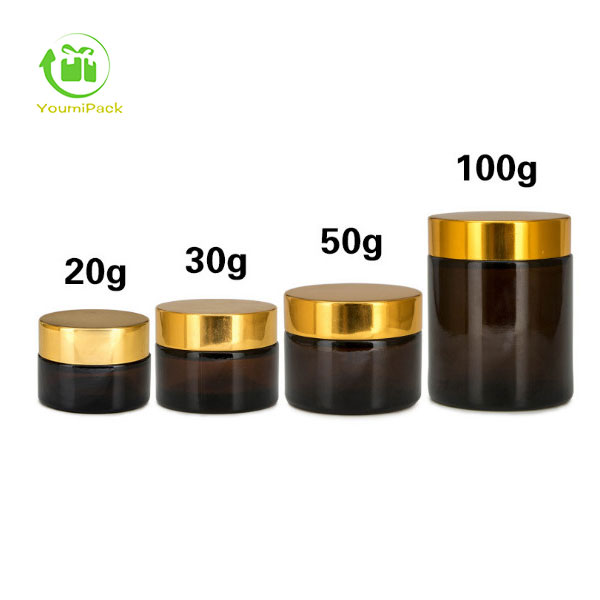Dark brown glass jar with gold lid