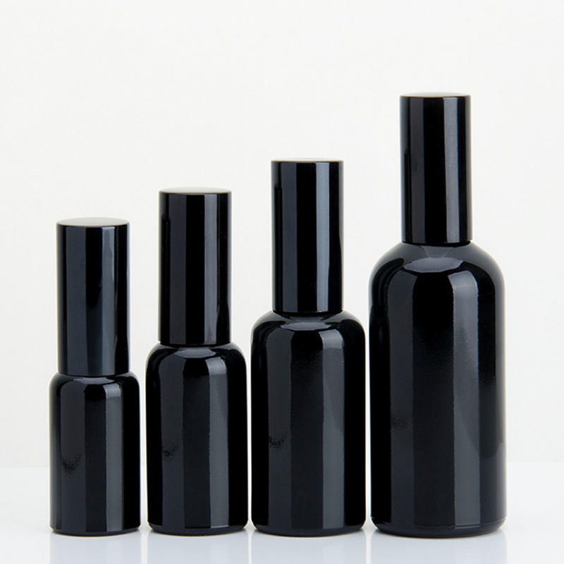 Dark violet glass cosmetic bottle with pump